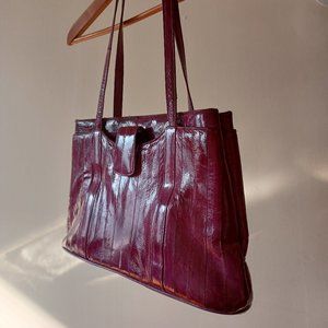 Purple eel skin purse